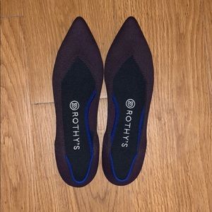 Rothy’s dark purple, pointed flats.